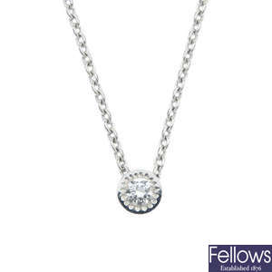 DE BEERS - an 18ct gold diamond single-stone necklace.