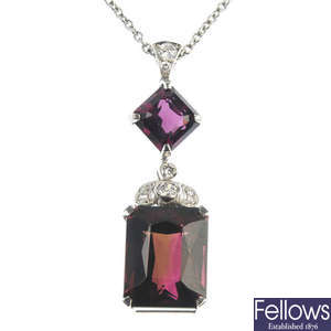 A tourmaline and diamond pendant with chain.