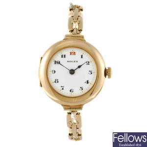 ROLEX - a lady's 14ct yellow gold bracelet watch.