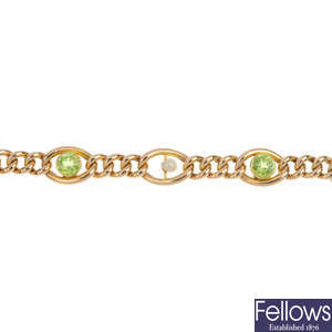 An early 20th century 15ct gold peridot and seed pearl bracelet.