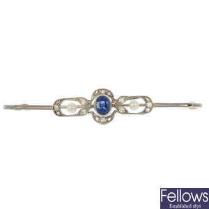 An early 20th century platinum and 12ct gold sapphire, diamond and seed pearl bar brooch.