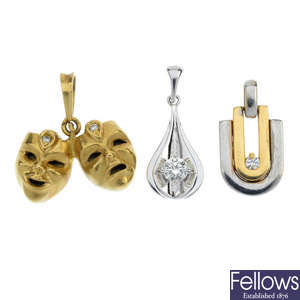 A selection of three diamond pendants.