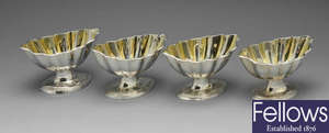 A set of four George III silver salts.