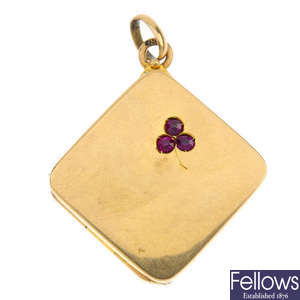 An early 20th century 18ct gold ruby locket.