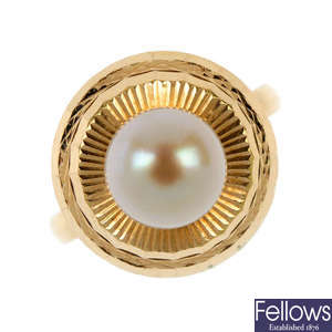 A cultured pearl ring.