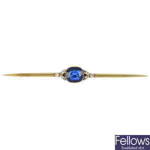 A mid 20th century synthetic sapphire and diamond bar brooch.