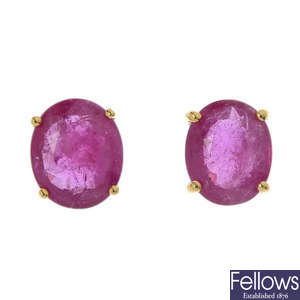 A pair of 18ct gold oval-shape glass-filled ruby ear studs. 