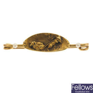 A late 19th century 18ct gold seed pearl mouse brooch.