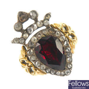 A garnet and diamond dress ring.