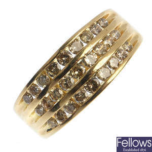 An 18ct gold diamond three-row ring.