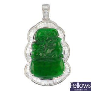 A dyed jade and diamond pendant.