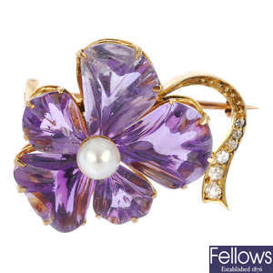 An amethyst, cultured pearl and diamond pansy brooch.