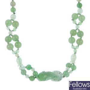 A jade and quartz necklace.