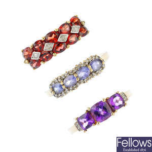 A selection of four 9ct gold diamond and gem-set rings. 