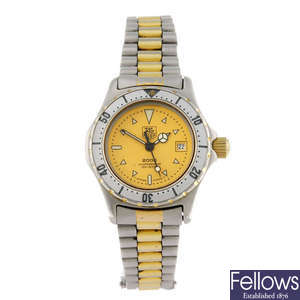 TAG HEUER - a lady's bi-colour 2000 Series bracelet watch.