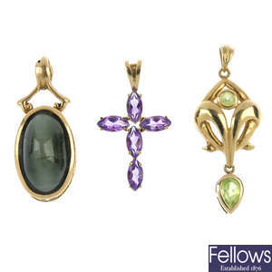 A selection of eleven gem-set pendants. 