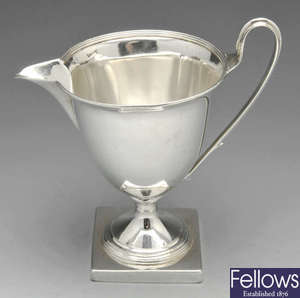 A George III silver cream jug by Henry Chawner.