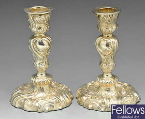 A pair of late 19th century small silver candlesticks.