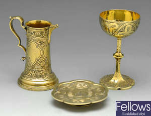 A Victorian silver-gilt travelling communion set.