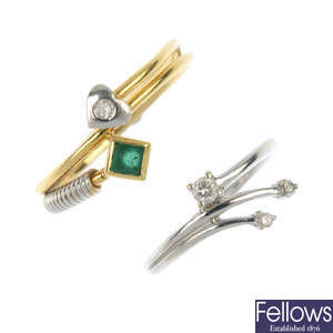 Two diamond and emerald rings.