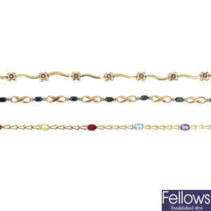 A selection of three gem-set and diamond bracelets. 