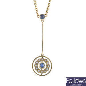 An early 20th century 9ct gold sapphire and split pearl pendant. 