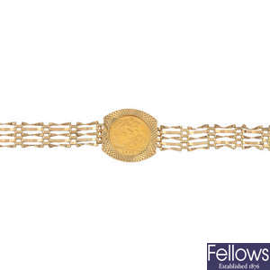 A 9ct gold mounted half-sovereign bracelet. 