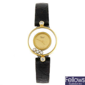 CHOPARD - a yellow metal lady's Happy Diamond wrist watch.