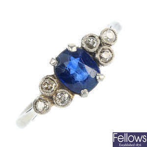 A mid 20th century platinum and 18ct gold sapphire and diamond ring.