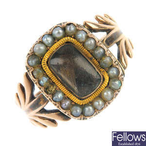 An early 19th century gold split pearl mourning ring. 