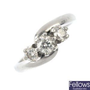 A platinum diamond three-stone crossover ring.