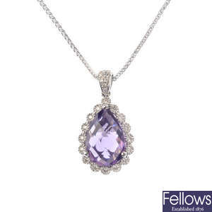 An 18ct gold amethyst and diamond cluster pendant.