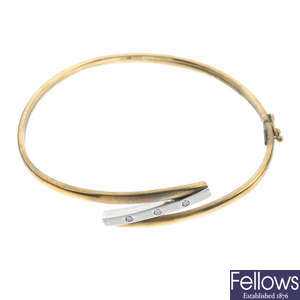 A 9ct gold paste bangle and a gate bracelet.
