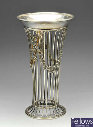 An early 20th century silver openwork vase, missing liner.