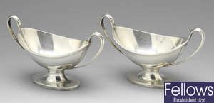 A pair of late Victorian silver pedestal salts.