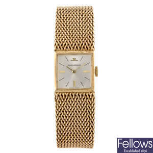 JAEGER-LECOULTRE - a lady's 9ct yellow gold bracelet watch.