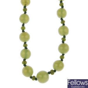 A jadeite pendant and two gem bead single-strand necklaces.