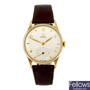 OMEGA - a gentleman's 9ct yellow gold wrist watch. 