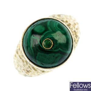 A malachite and emerald dress ring.