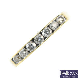 An 18ct gold diamond half-circle eternity ring. 