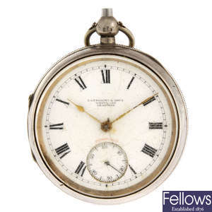 A silver open face pocket watch by Fattorini & Sons with another pocket watch.