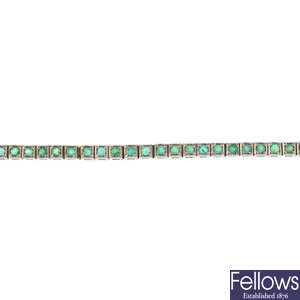 An emerald line bracelet.