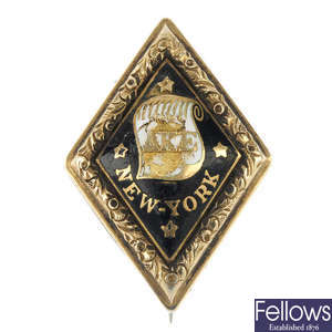 A mid 19th century enamel Yale college fraternity pin.