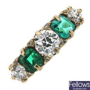 An early 20th century 18ct gold emerald and diamond five-stone ring.