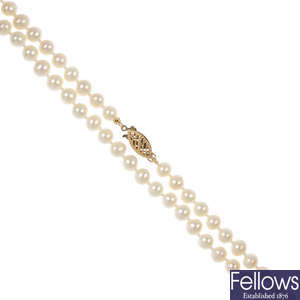 Three single-strand cultured pearl necklaces.