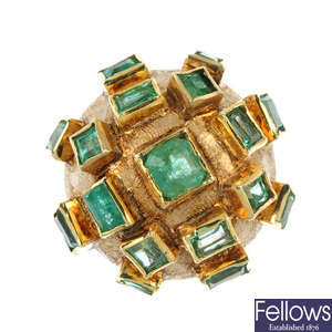 An emerald bombe ring.