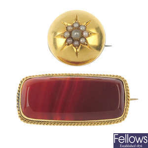 Two gem-set brooches.