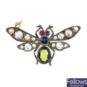 A gem-set fly pendant.