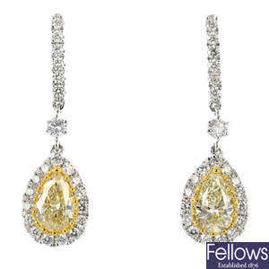 A pair of coloured diamond and diamond ear pendants.