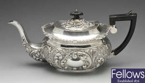 An Edwardian silver teapot.